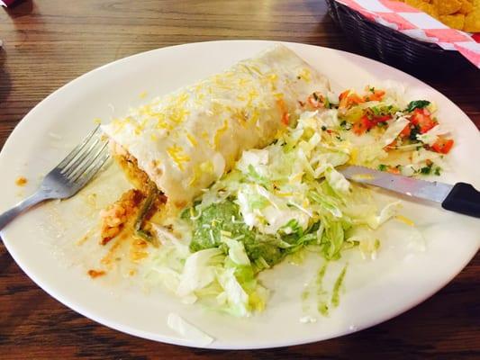 California Chicken burrito. Grilled chicken, rice, beans, squash, peppers and grilled onions.