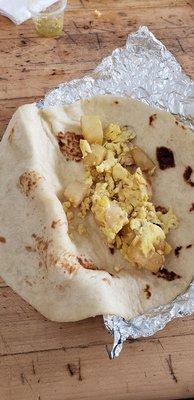 Breakfast tacos. Big tortilla and almost empty.  All of them were like this but the bean and cheese. At almost $2 each they need to be full!