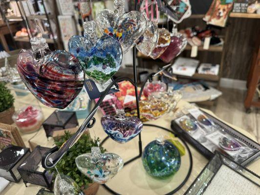 Fabulous glass, candles, jewelry, tea towels and garden decor.