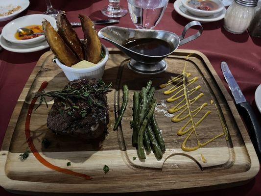 Filet with potatoes and Green beans.