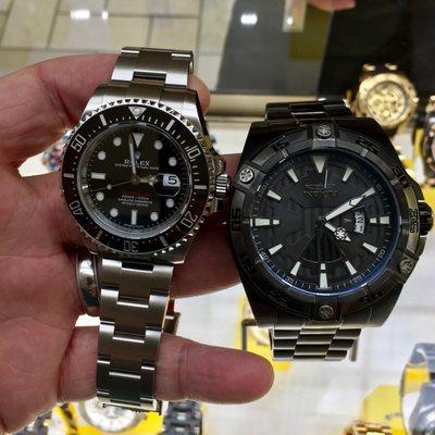 Well, I never thought of my watch as small...until now. Only the watch on the right has license to call itself "The Vader" ;-)