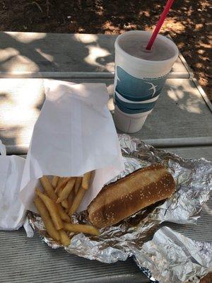 Hamburger steak Jr, fries, drink at the picnic table in the shade