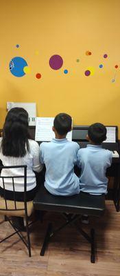 More and more families have been choosing our piano ensemble programs like this family piano trio. They even participate in talent shows!