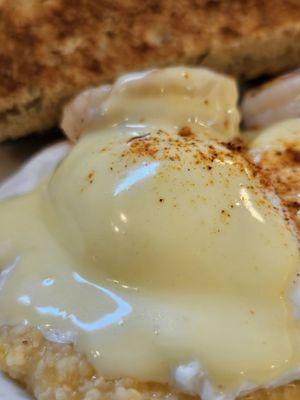 Shrimp with egg Benedict and grits