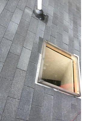 This is a glass skylight we installed along side a plumbing vent stack that we double booted to make sure the neoprene gromme...