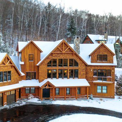 Adirondack style home architectural design &  build in Lincoln,NH by Longfellow Design Build.