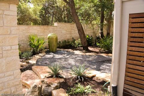 Water feature with low maintenance, native plants.