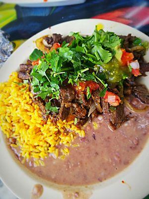 Skirt steak with rice and beans