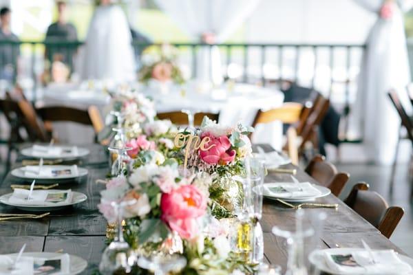 Our centerpieces and decor on the head table. PC: www.Schyne.com