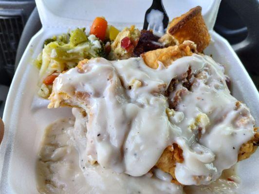 Chicken fried steak times two in white gravy