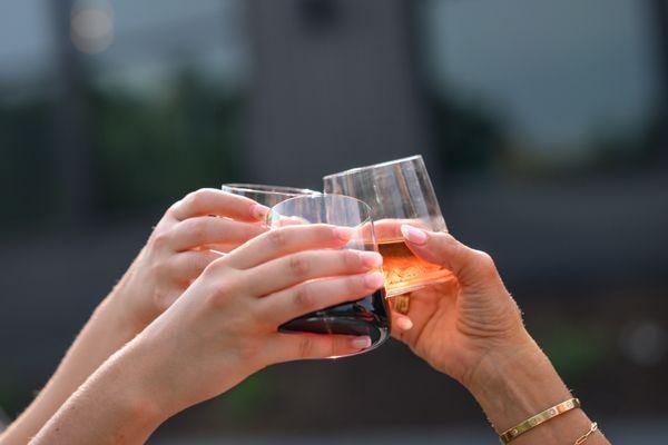 Cheers on our new patio overlooking the 19th and 18th hole.