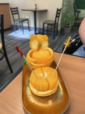 free orange cut into a cute bear shape