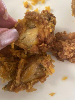 Old dry chicken with a rubbery waxy texture