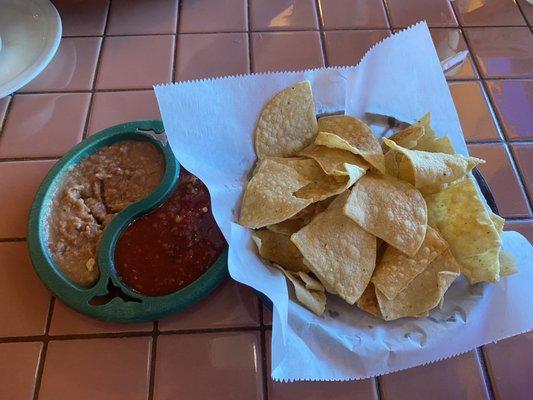 Complimentary chips w/ bean dip and salsa