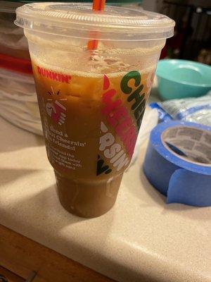 A garbage, watered down, bitter(old coffee) and somehow frothy iced coffee from the worst Dunkin around.