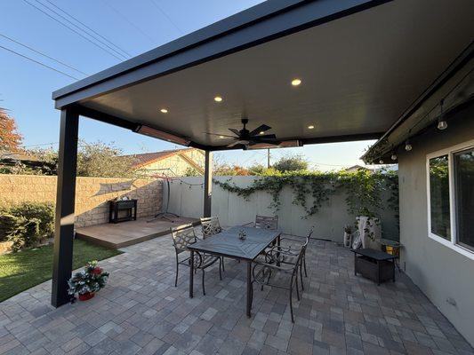 Insulated solid roof patio w/ heaters, fan and lighting