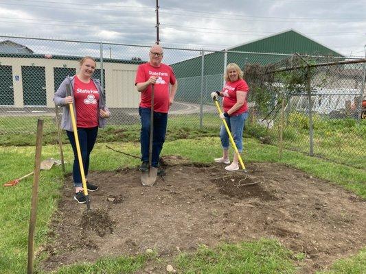 Our team working to build a garden during the Untied Way Day of Caring.