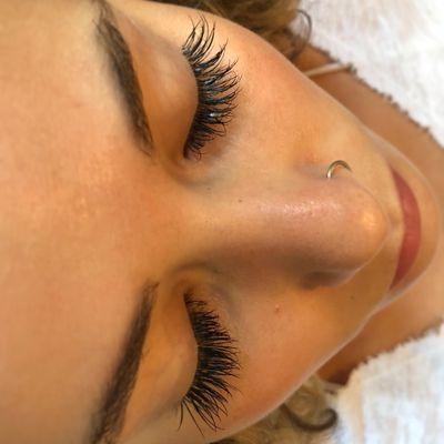 Ladies! We are certified in Novalash Eyelash Extensions and this pretty lady is rockin a full set of classics