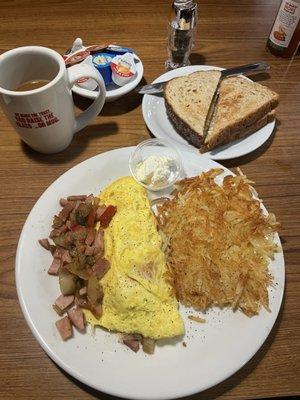 Denver Omelette, hash browns, 7 grain toast, coffee. Cooked perfectly and delicious. Good coffee too.