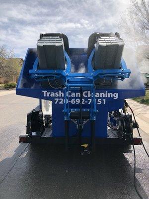 Trash containers are high pressure steam cleaned and sanitized.