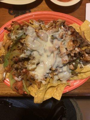 Fajita nachos with chicken and beef. The portion size is huge!