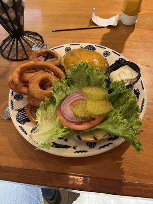 Medium cheeseburger with onion rings as the side!