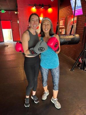 Mother and daughter enjoying a special moment together after their workout