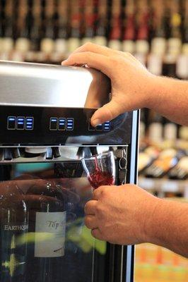 Tasting area features four red and four white wines to test.