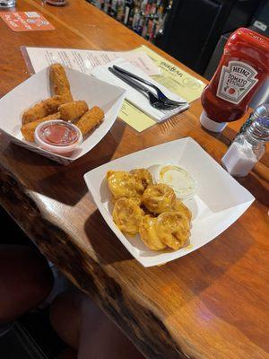 Fried shrimp and mozzarella sticks