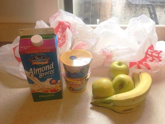 FOUR bags for this amount of groceries that could've been easily packed into 1...maaaaybe 2.