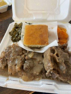 Oxtails with rice, greens, sweet potatoes, corn bread