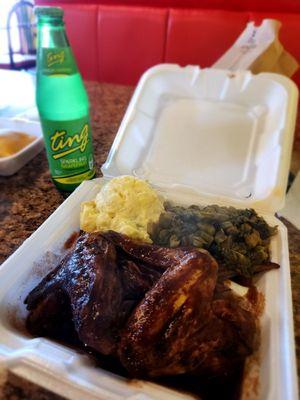 Wings, steamed calaloo, potato salad