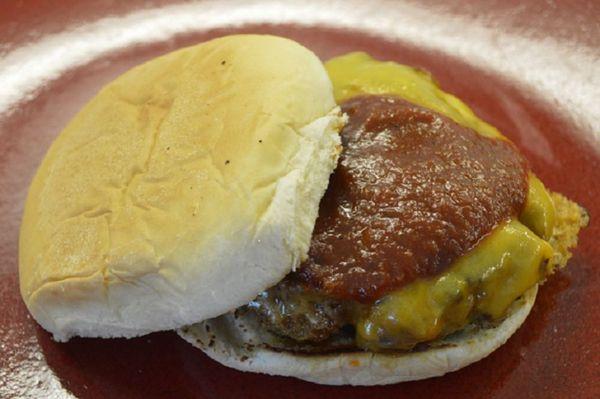 Smash Burger with cheese made of ground beef and pulled pork. Made in house