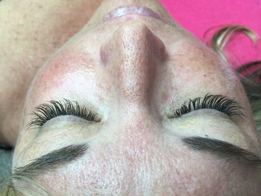 Classic and volume lashes to fill a natural lash void in right eye