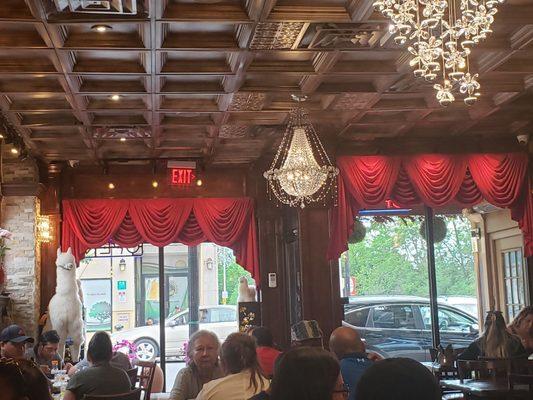 From windows, ceiling chandelier, dining room