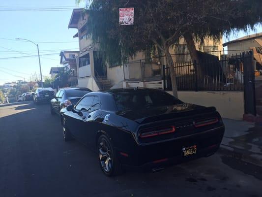 Illegally towing cars today on Cortez st. The no parking sign is not visible.