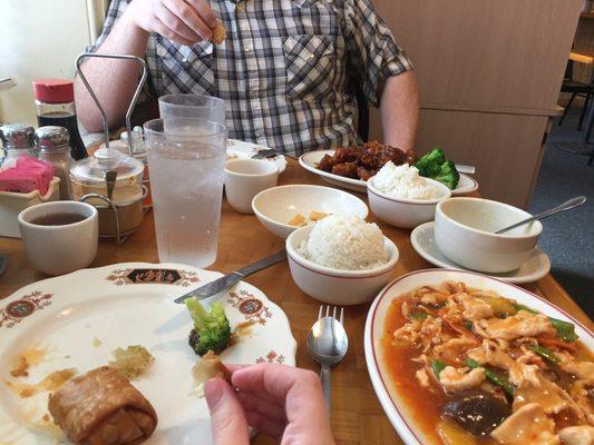 Dried ginger mango chicken and general tso's chicken. Egg roll on the left. Big pot of jasmine tea comes with everything.