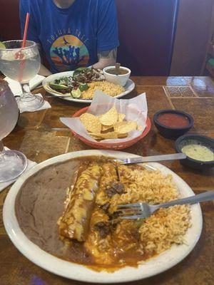 Beef fajita enchiladas and street tacos (al pastor).