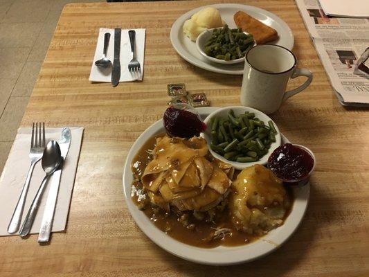 The classic Turkey, Dressing, Mashed Potatoes, Gravy and Cranberry Sauce dinner.