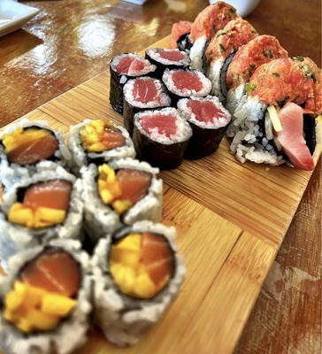 Salmon roll, tuna roll, and a dynamite roll