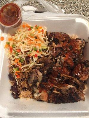 Large Jerk Chicken meal w/ rice & peas and cabbage ($11) - Extra Jerk sauce on the side!