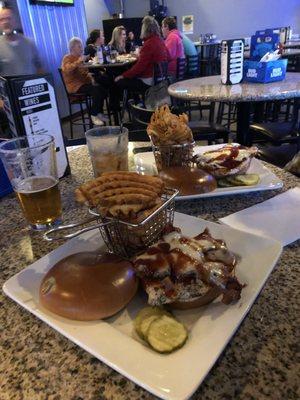 Chicken sandwich & waffle fries.