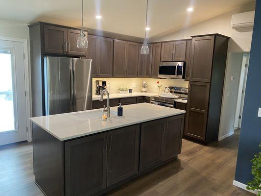 Tomah Remodel 
Maple Cabinets with Quartz countertops and LVP Flooring