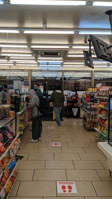 Customers buying & exiting store.