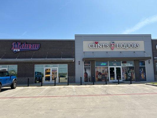 Liquor store and pub next door