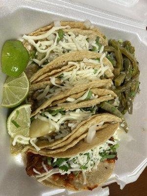 Red and green pork tacos and Mexican cactus salad