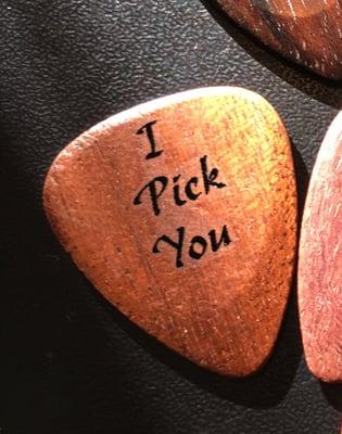 One of the engraved guitar picks