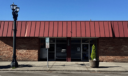 The front of our building from Colby Ave.