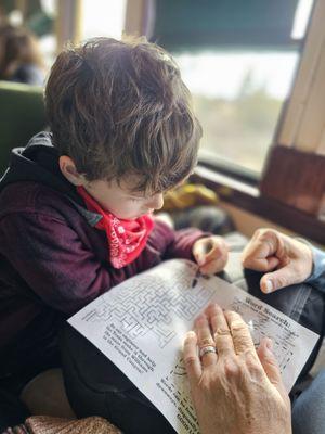 Grandson coloring on train