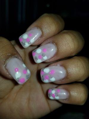 Before pic... these are the nails and designs i had on my nails before they fixed them at Eden Nails...